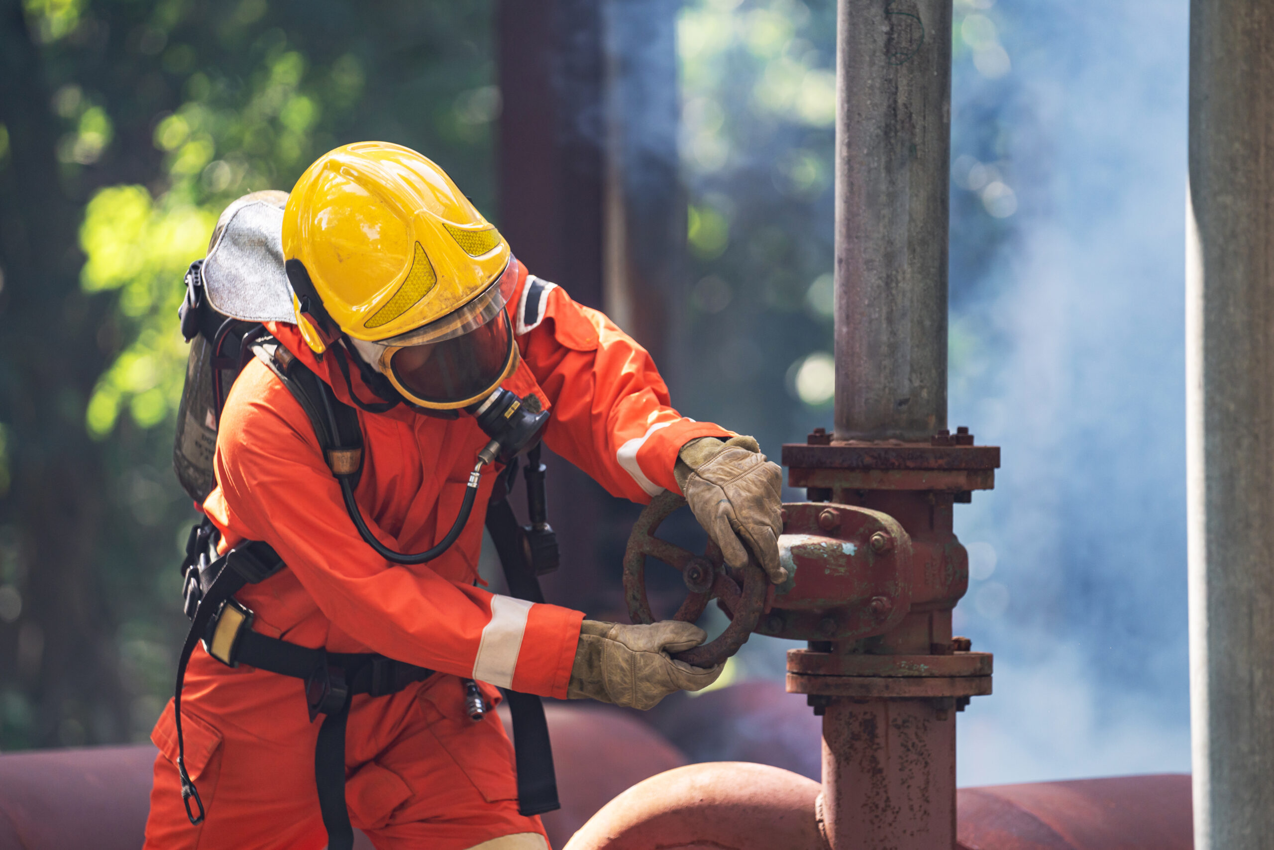 Firefighter in Full Protective Gear. Heroic Fireman Combats Intense Blaze with Life-Saving Equipment. Firefighter in Full Protective Gear. Heroic Fireman Combats Intense Blaze with Life-Saving Equipment.